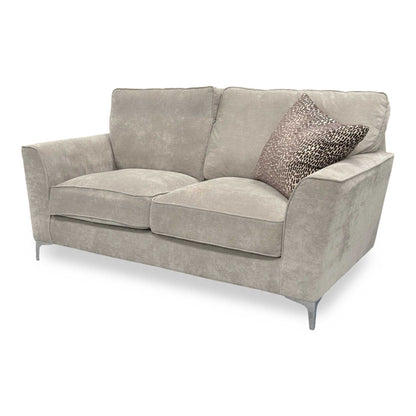 Side view of the Legend 2-seater sofa in Kingston Silver fabric, featuring a classic back design with plush cushions and elegant dark wood feet.
