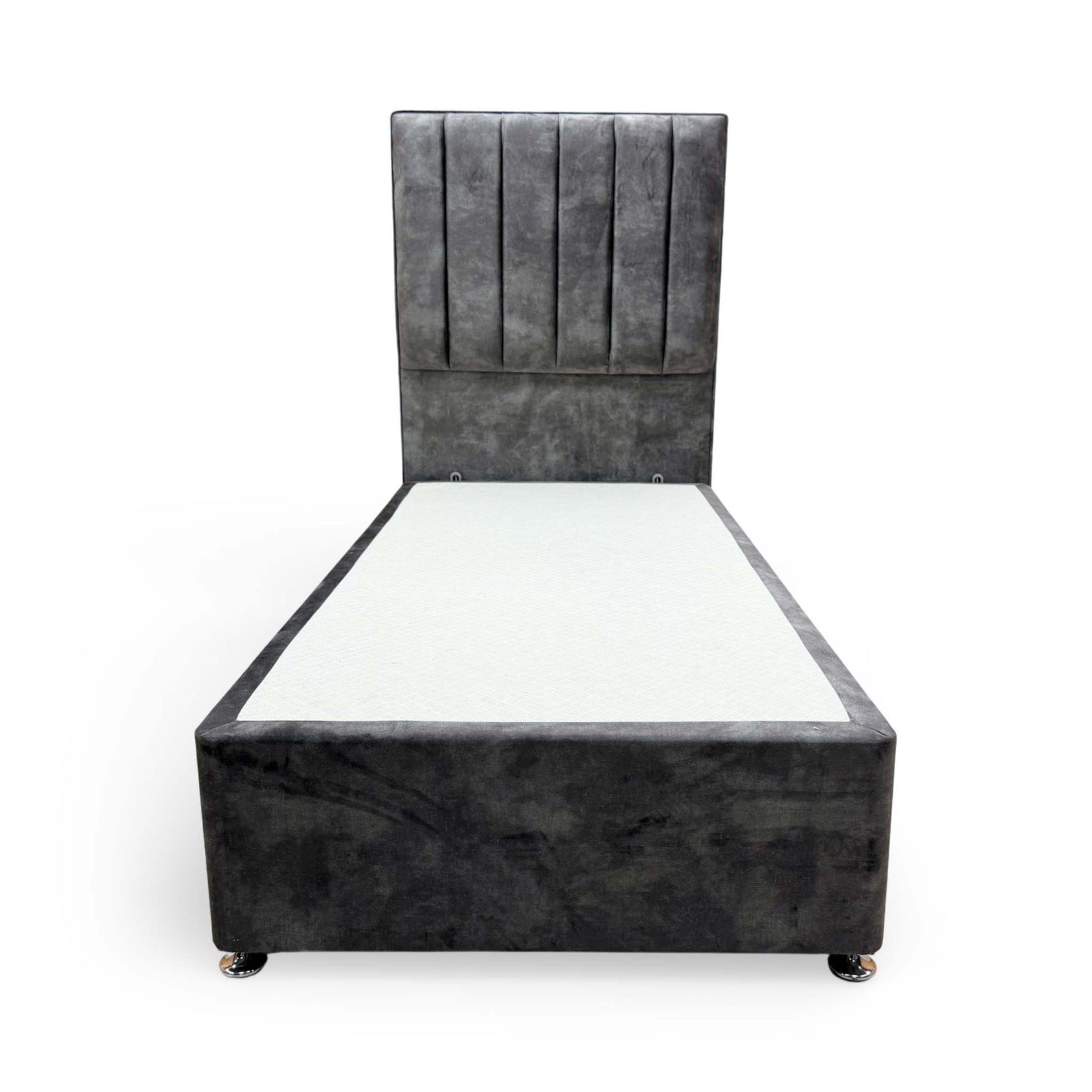 Front view of the single divan bed, highlighting the sophisticated grey velvet upholstery and detailed headboard stitching.