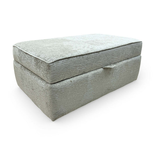 Front view of the Sasha Storage Footstool, highlighting the high-quality ivory chenille fabric and sturdy construction.