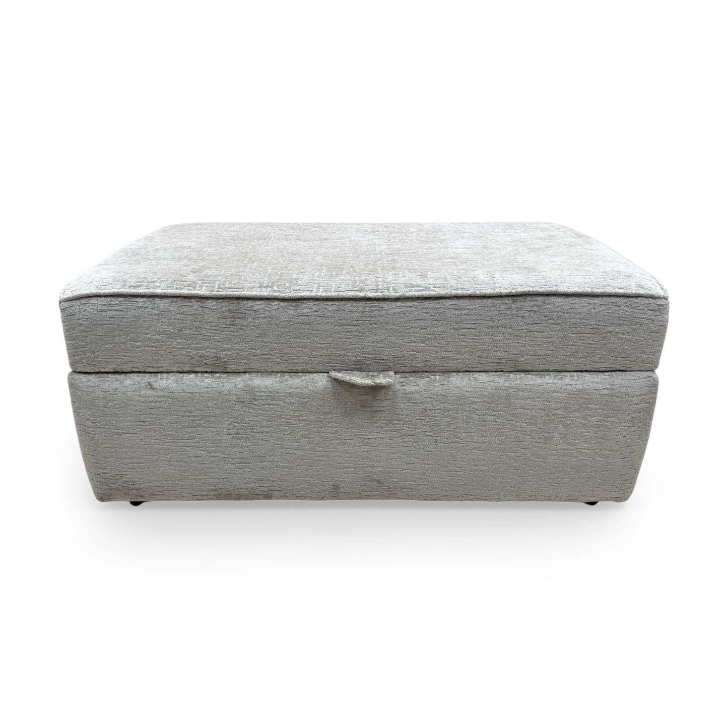 Front view of Sasha footstool with the lid open, revealing a spacious internal storage compartment for cushions and blankets.