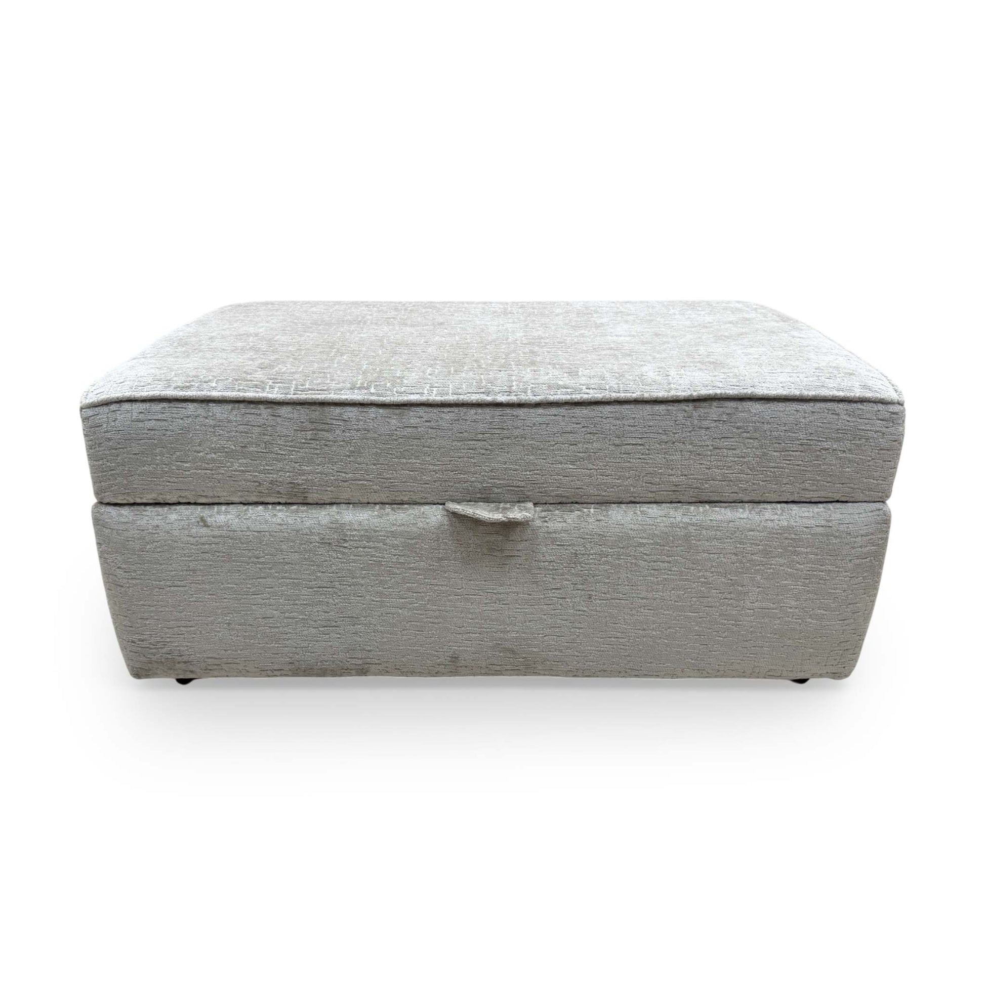 Front view of Sasha footstool with the lid open, revealing a spacious internal storage compartment for cushions and blankets.