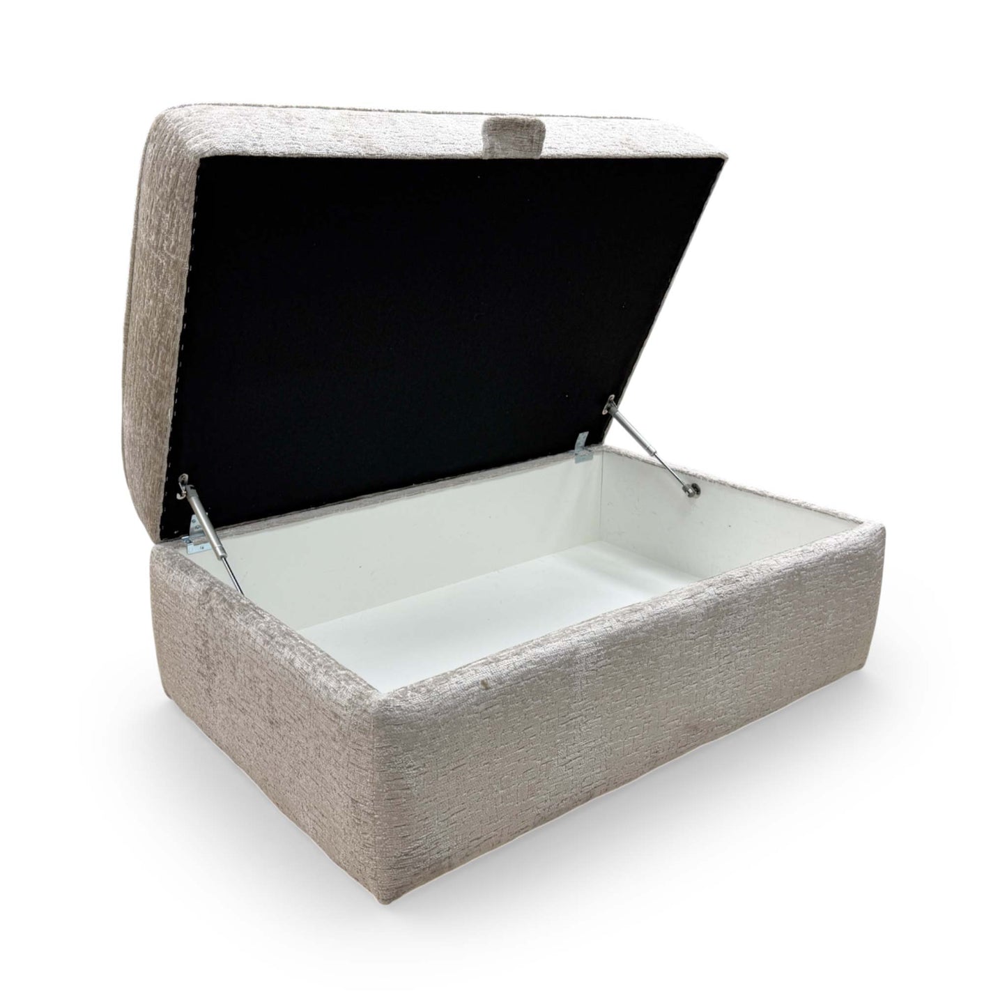 Detail view of the footstool’s hinge mechanism and interior storage lining, illustrating the practical design.