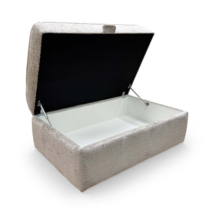 Detail view of the footstool’s hinge mechanism and interior storage lining, illustrating the practical design.