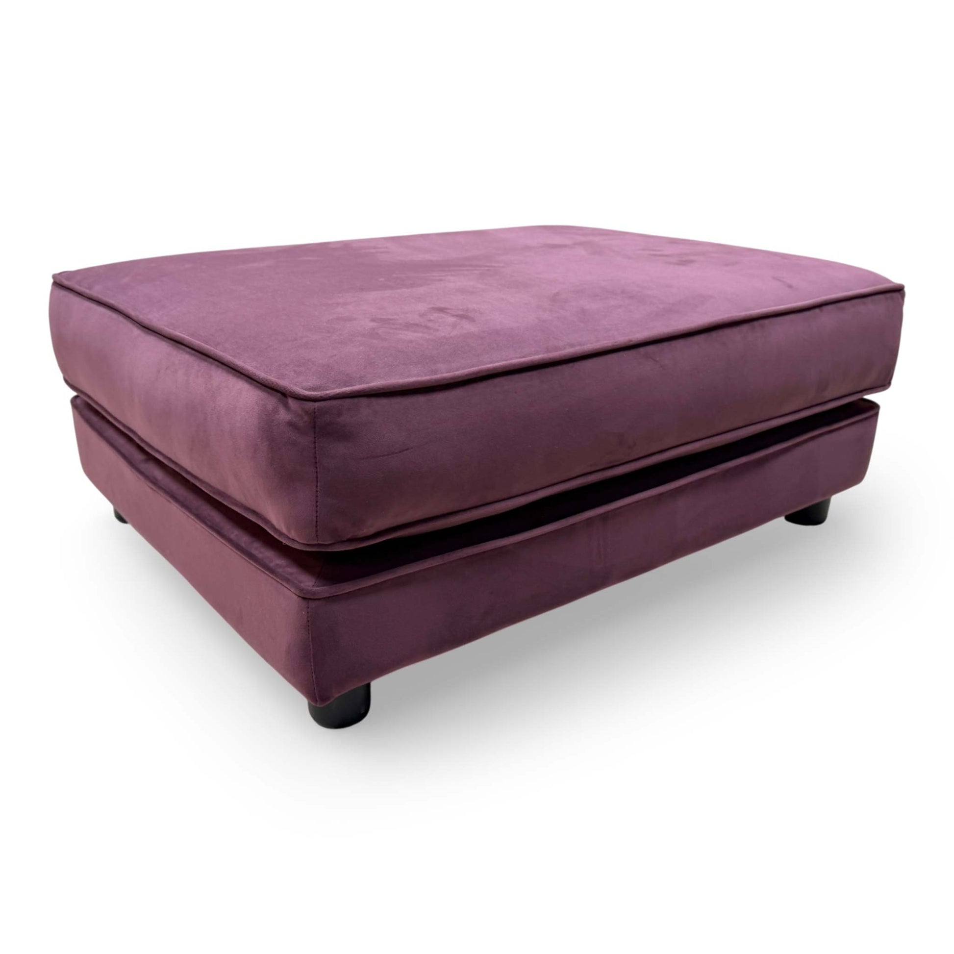 Front-facing shot of the The Lounge Co. footstool, highlighting its elegant rectangular silhouette and tactile frosted velvet finish.