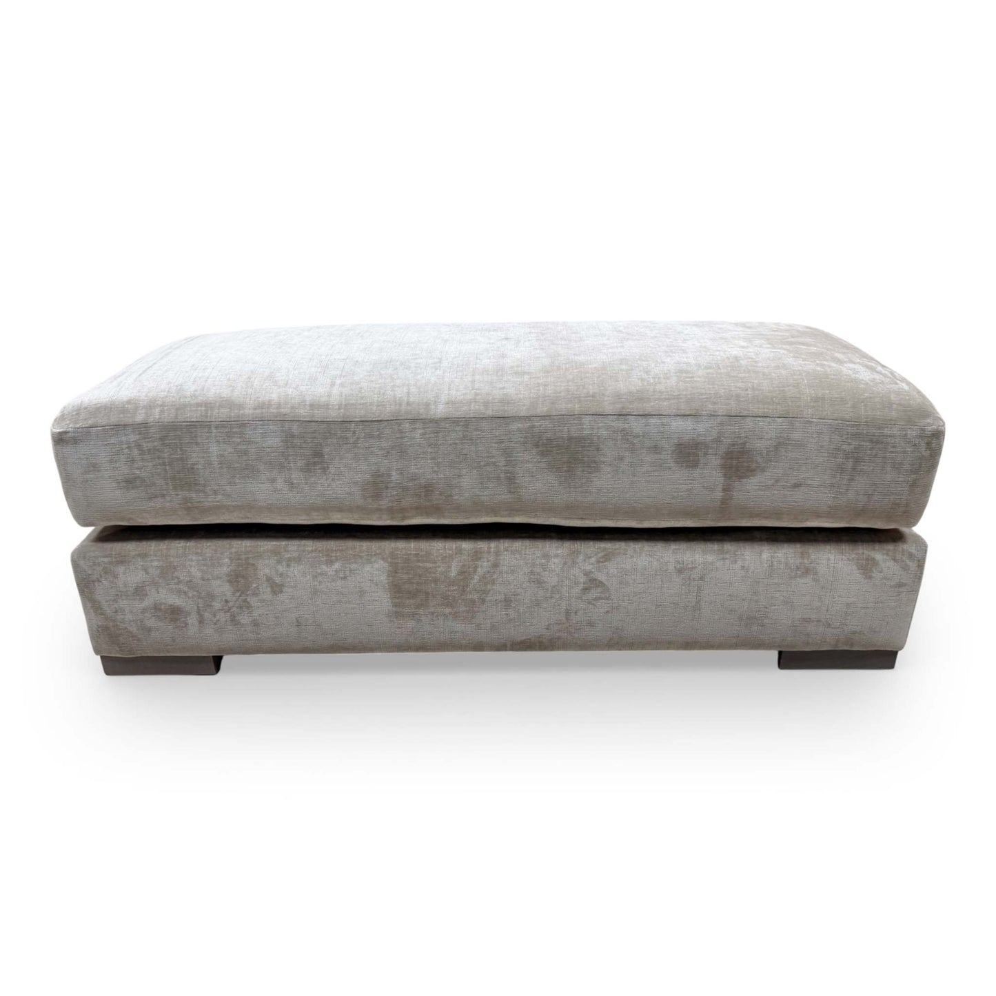Front view of large Bench Footstool upholstered in soft sand velvet, showcasing its elegant rectangular design and neutral tone.