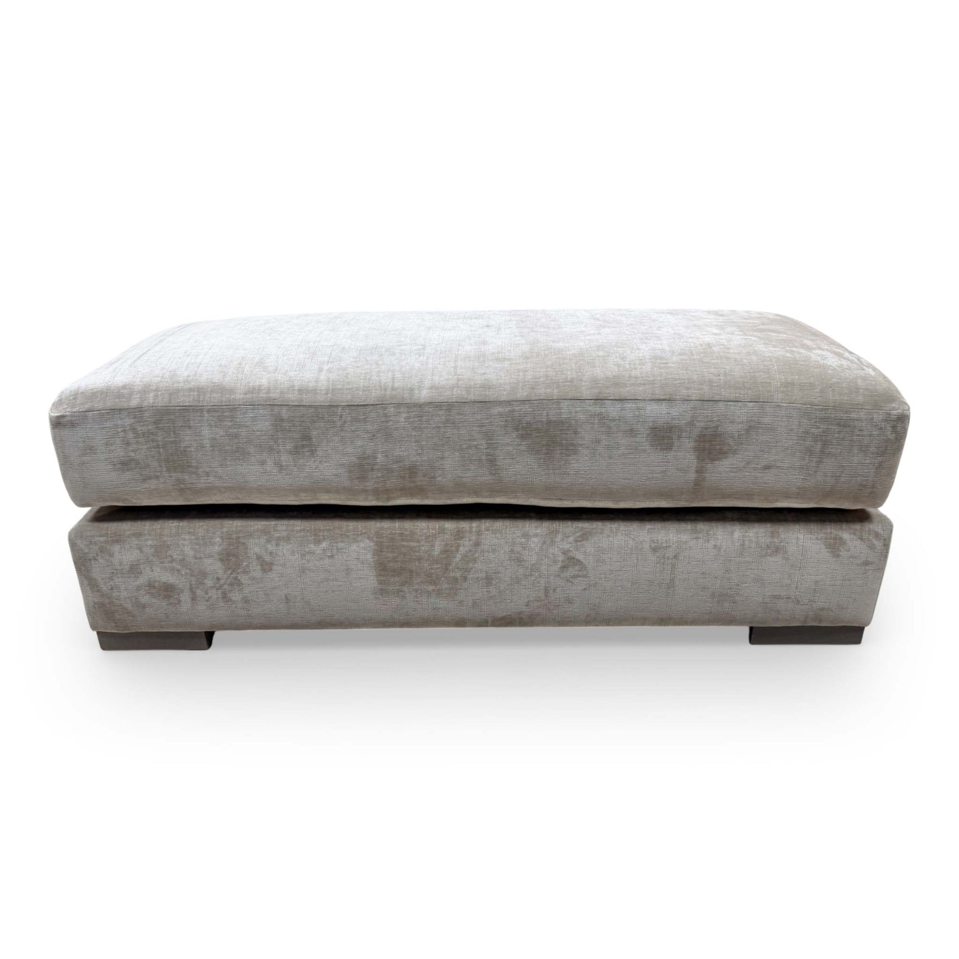 Front view of large Bench Footstool upholstered in soft sand velvet, showcasing its elegant rectangular design and neutral tone.