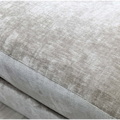 Close-up of the sand velvet fabric on the Jackson footstool, illustrating the high-quality tactile luxury and neutral color.