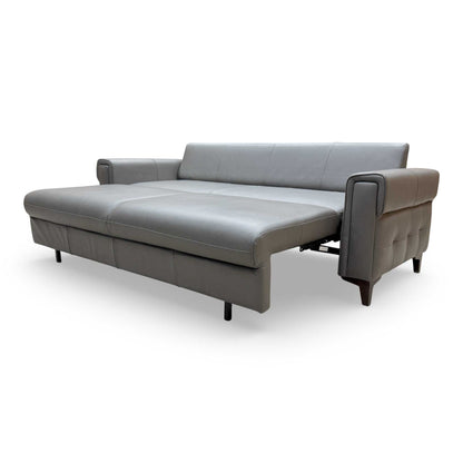 Side view highlighting the back support and sturdy construction of the Zoom leather sofa bed.