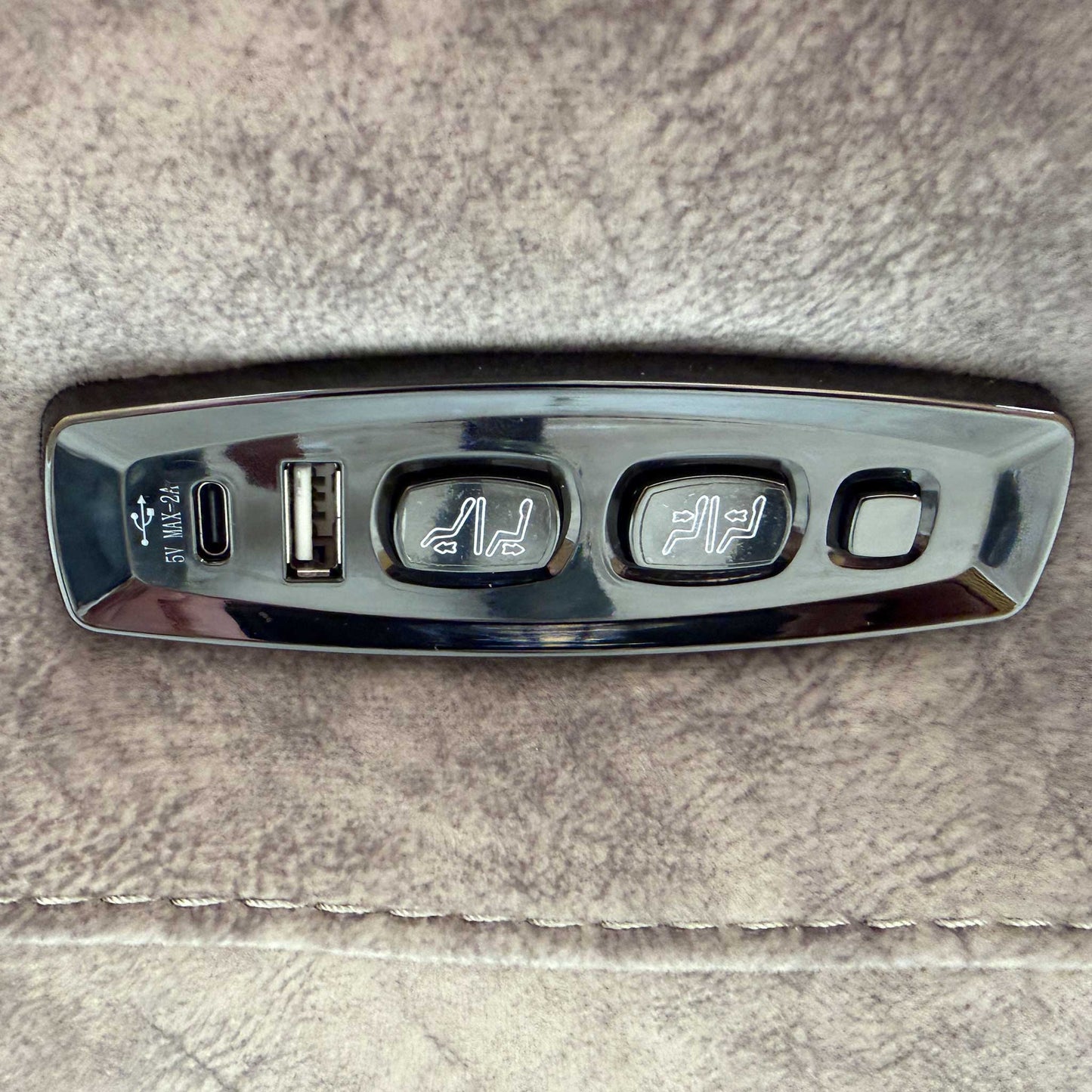 Close-up on the power control panel with built-in USB ports.