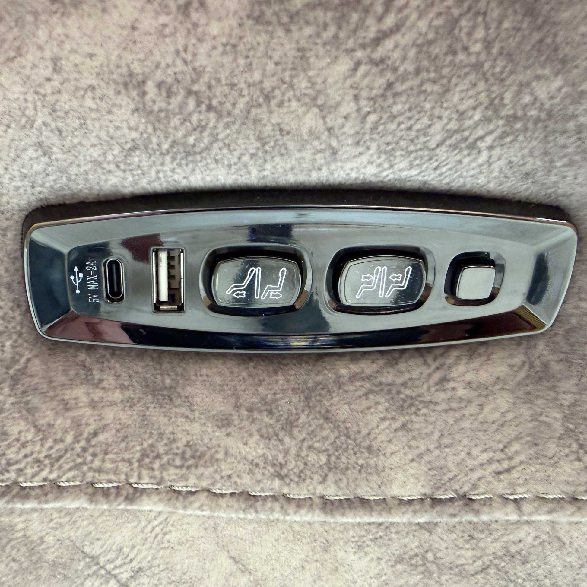 Close-up on the power control panel with built-in USB ports.