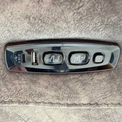 Close-up on the power control panel with built-in USB ports.