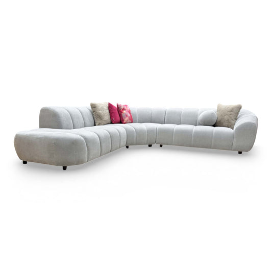 Full view of the Waldorf chaise sofa, illustrating the expansive 300cm width and inviting, sink-in seat cushions.