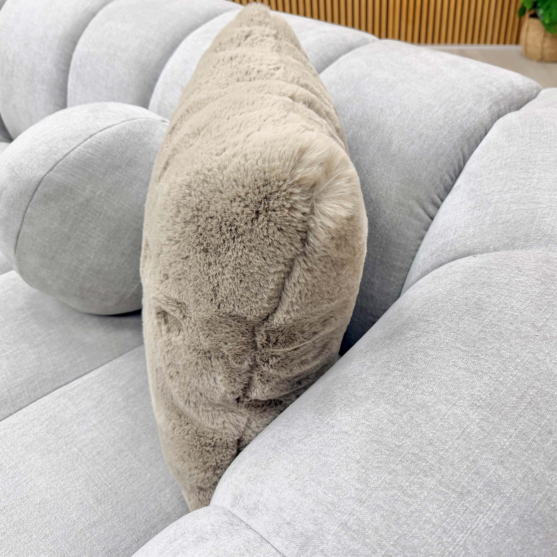 Close-up of the Waldorf sofa's corner section, emphasizing the seamless upholstery and sophisticated silver-grey tones.