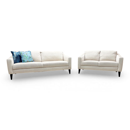 Front view of the Oslo Vogue 3-seater sofa, illustrating its generous proportions and clean, minimalist lines.