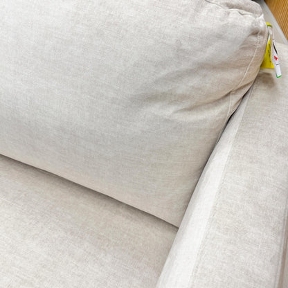Close-up of the plush seat and back cushions of the Oslo sofa, showcasing the durability and tactile finish of the cream velvet.