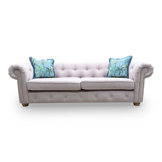 Full view of the lilac Belair sofa, demonstrating the symmetry of the rolled arms and the sophisticated aesthetic of the Plaza Linen collection.
