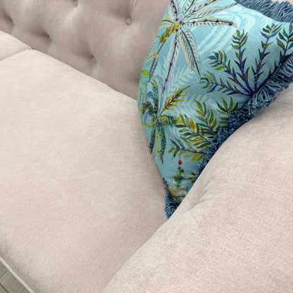 Detailed close-up of the lilac plaza linen fabric texture and the traditional deep buttoning on the Belair 4-seater sofa.
