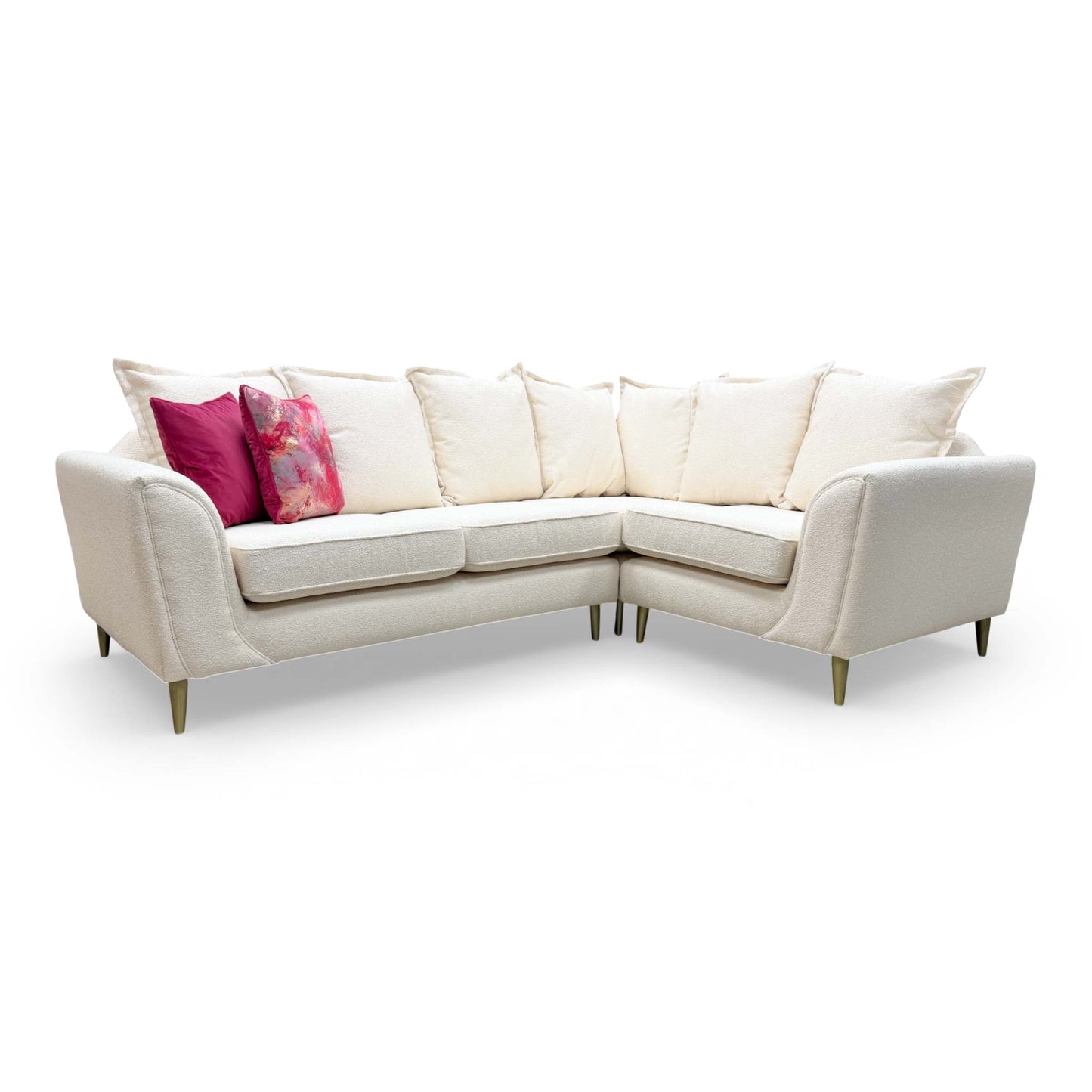Full view of the Alyssia corner sofa in cream, illustrating the generous proportions and modern silhouette.