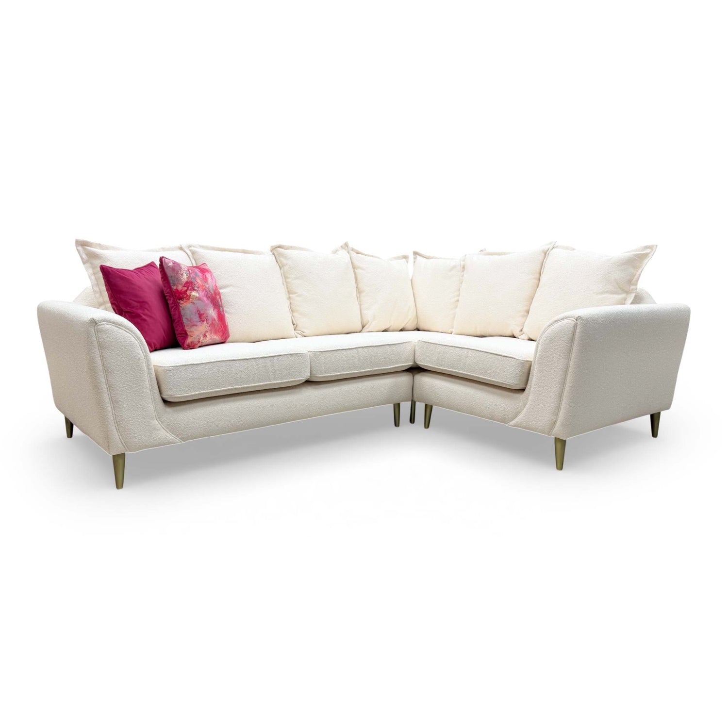 Full view of the Alyssia corner sofa in cream, illustrating the generous proportions and modern silhouette.