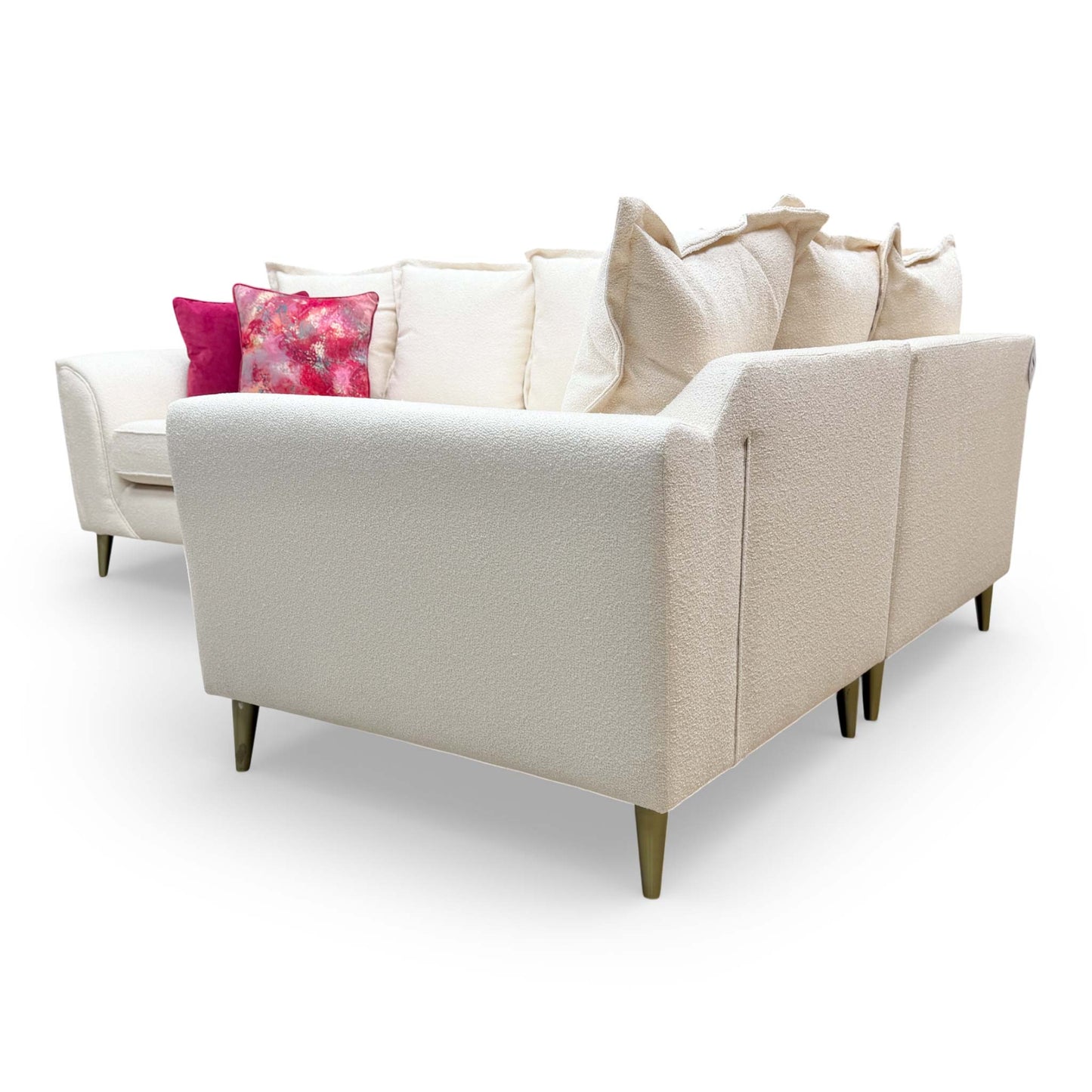 Front profile of the Alyssia corner sofa in cream, illustrating the generous proportions and modern silhouette.