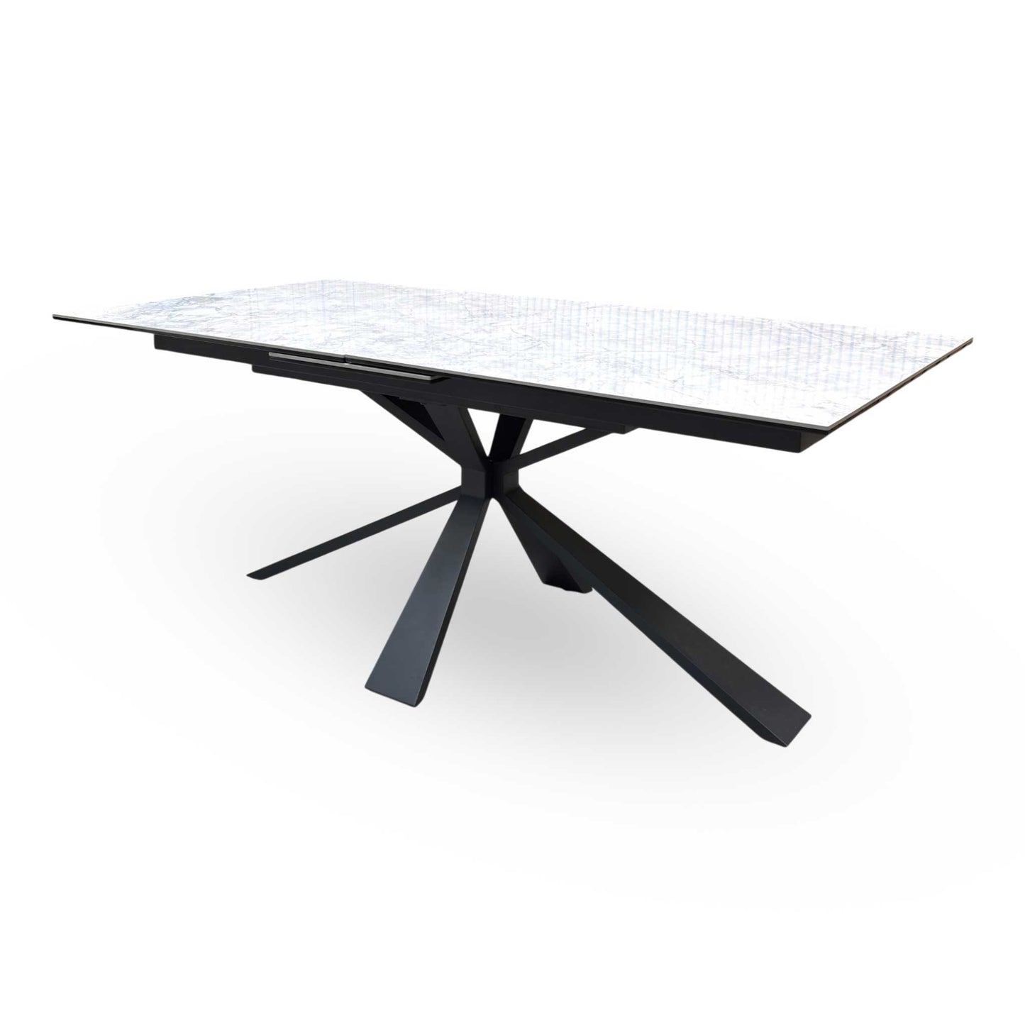 The Crete dining table fully extended to 220cm, demonstrating its large seating capacity and smooth extension seams.