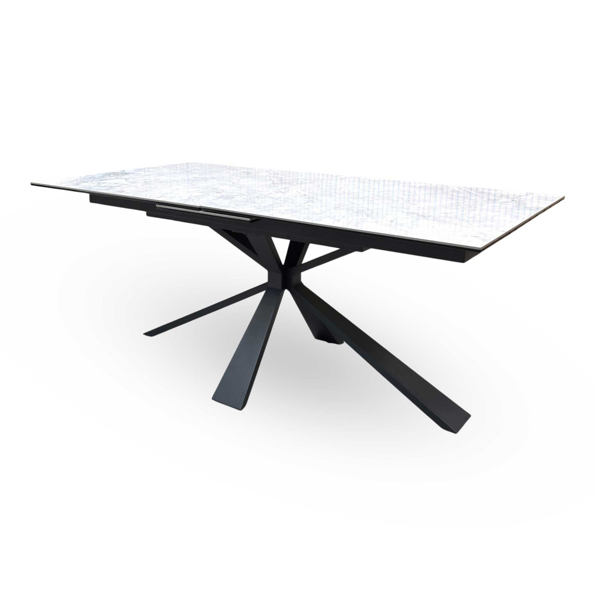 The Crete dining table fully extended to 220cm, demonstrating its large seating capacity and smooth extension seams.