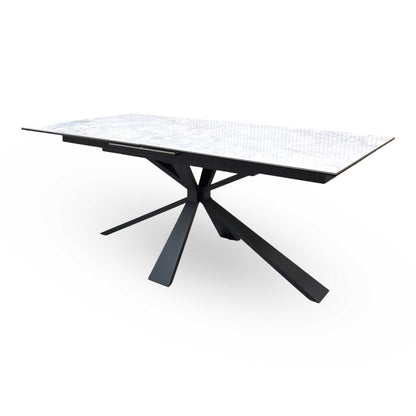 The Crete dining table fully extended to 220cm, demonstrating its large seating capacity and smooth extension seams.