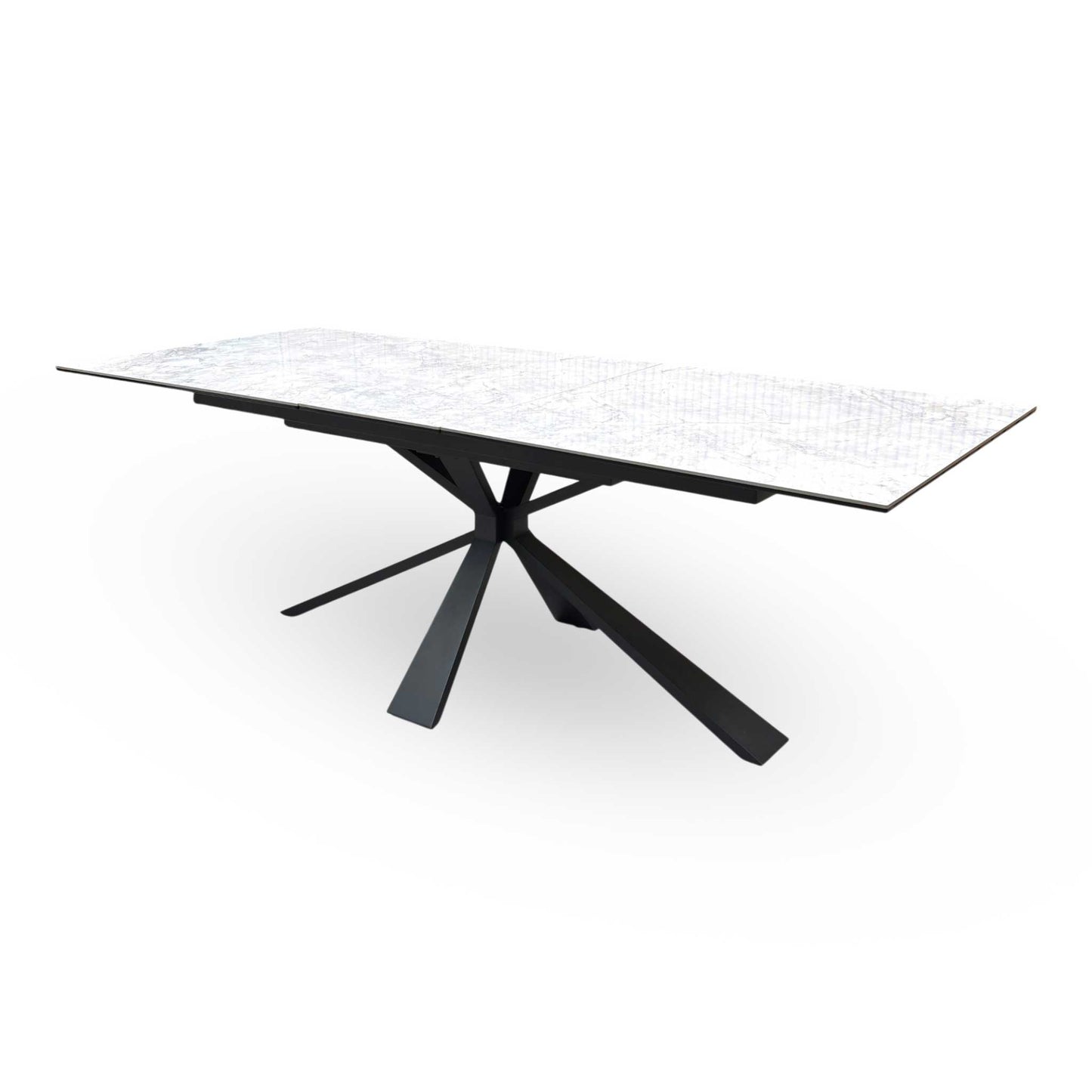 The Crete dining table fully extended to 220cm, demonstrating its large seating capacity and smooth extension seams.