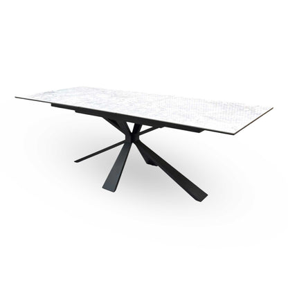 The Crete dining table fully extended to 220cm, demonstrating its large seating capacity and smooth extension seams.