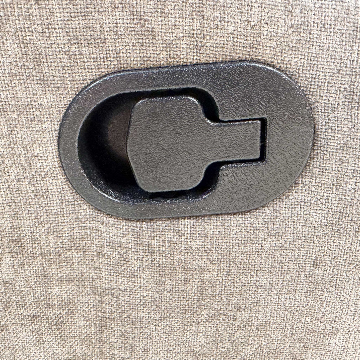 Detailed shot of the reclining handle and side panel, emphasizing the practical and easy-to-use manual controls.