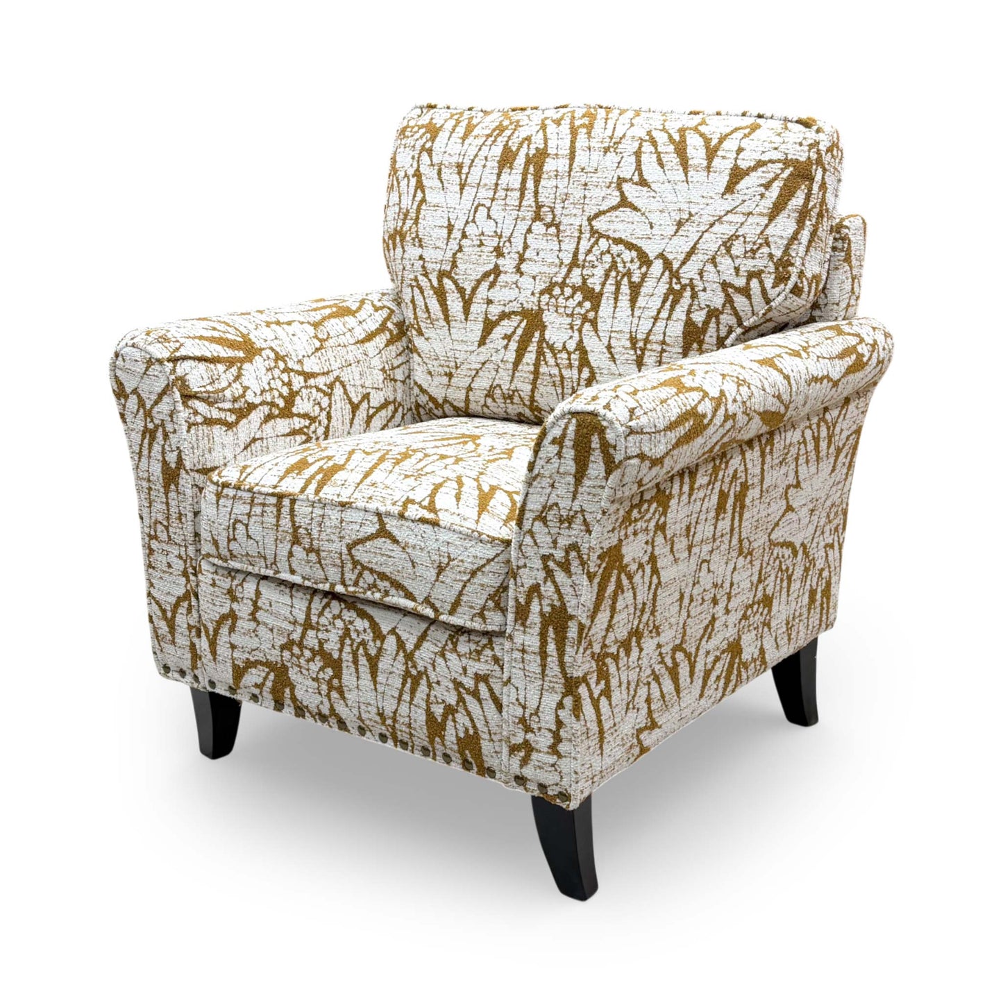 Angled view of the ‘Pippa’ armchair, emphasizing its stylish presence as a statement piece for a living room.