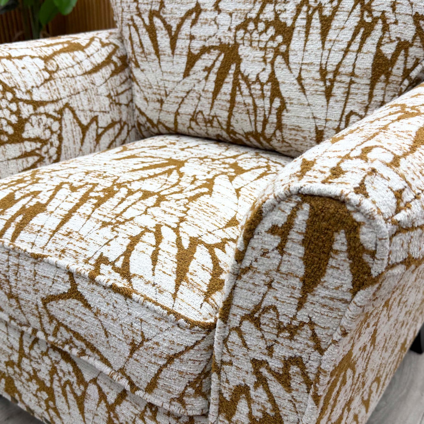 Close-up of the Mustard Floral Patterned fabric, demonstrating the intricate floral design and high-quality weave.