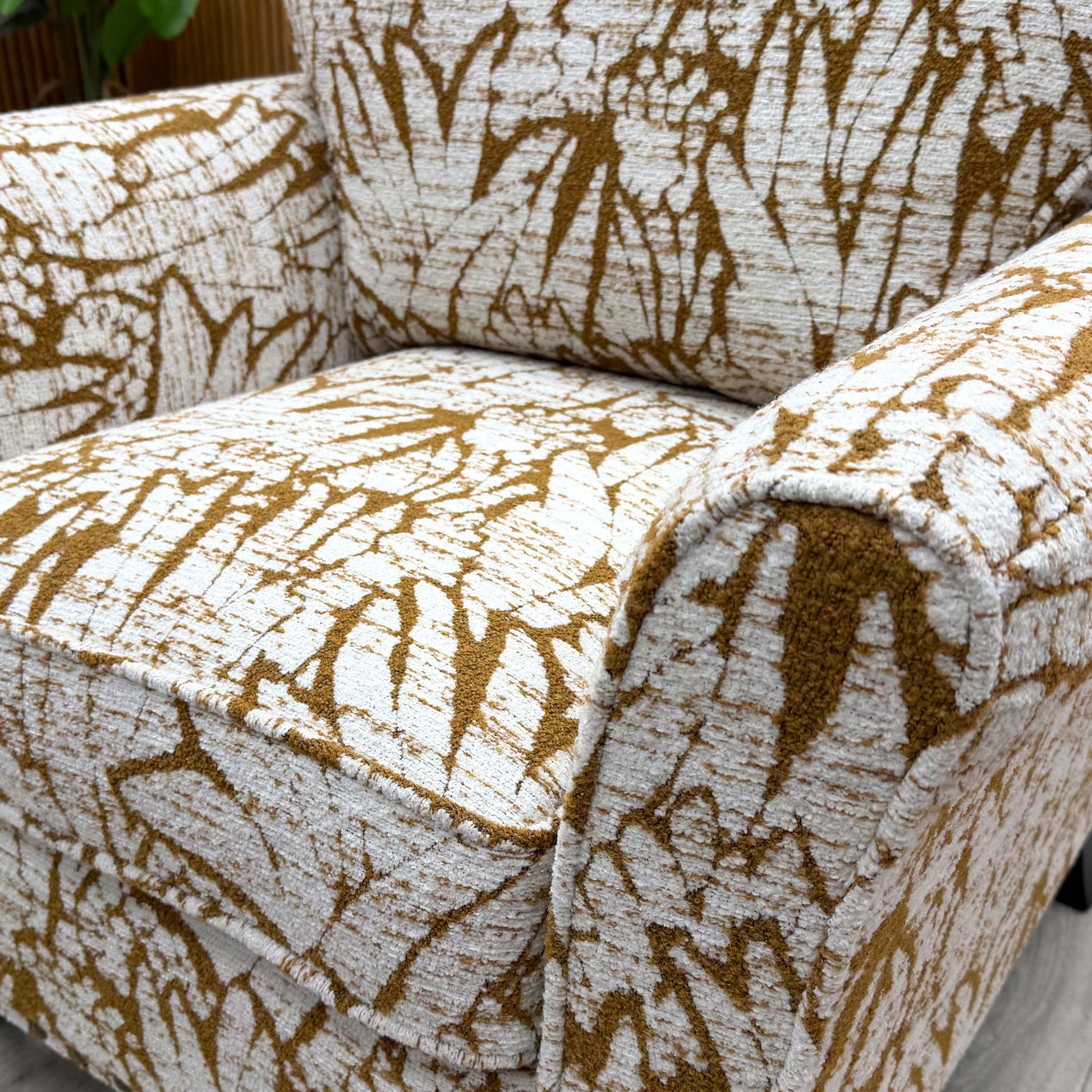 Close-up of the Mustard Floral Patterned fabric, demonstrating the intricate floral design and high-quality weave.
