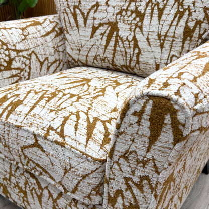 Close-up of the Mustard Floral Patterned fabric, demonstrating the intricate floral design and high-quality weave.