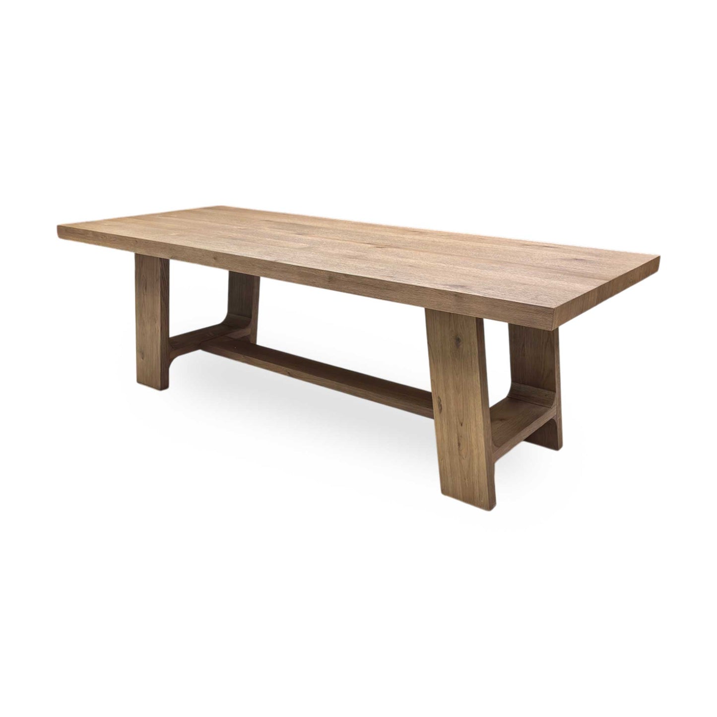 Full view Massimo 230cm fixed dining table in a warm cashew-finished solid oak with a rustic cracked grain texture.