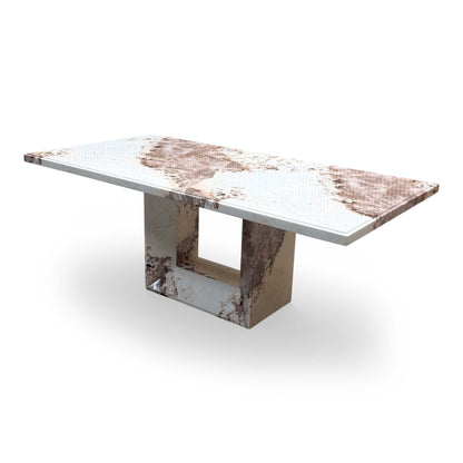Low-angle shot of the Artemis dining table, showing the underside support and stable architectural design.