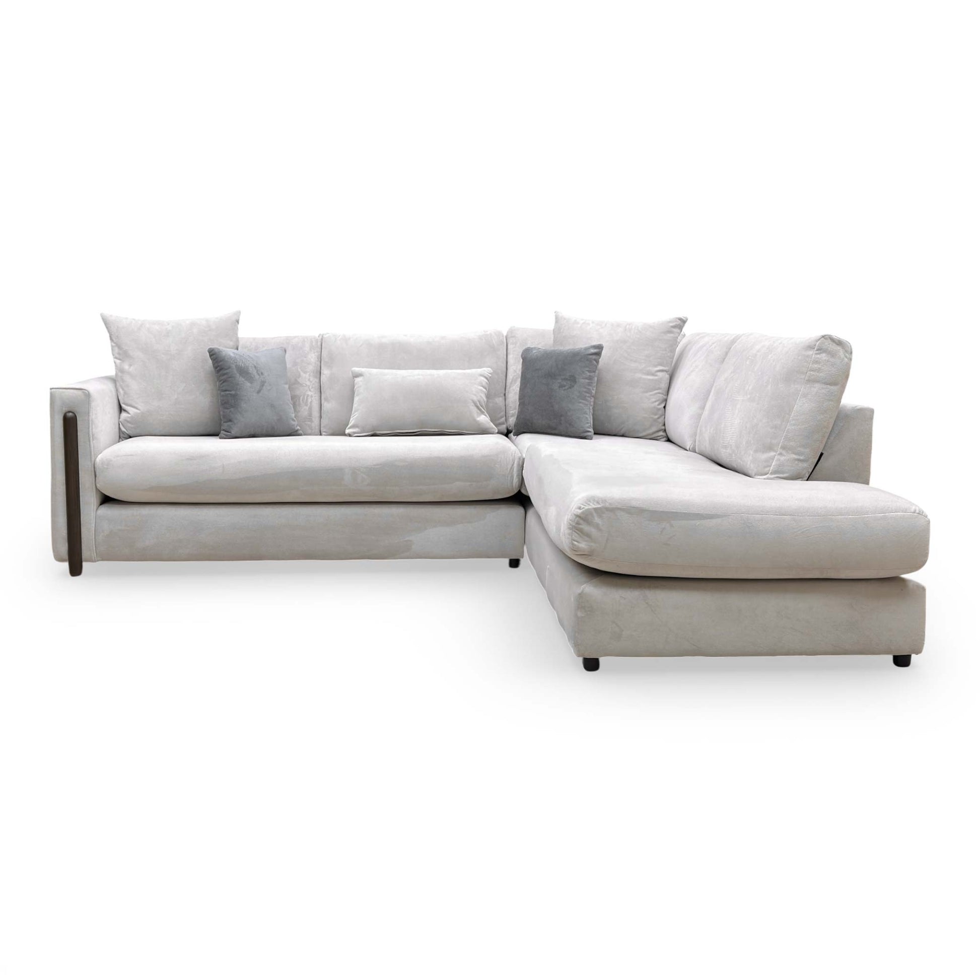 Angled view of the Barney sofa, emphasizing the clean lines and the modern aesthetic of the open-end chaise extension.