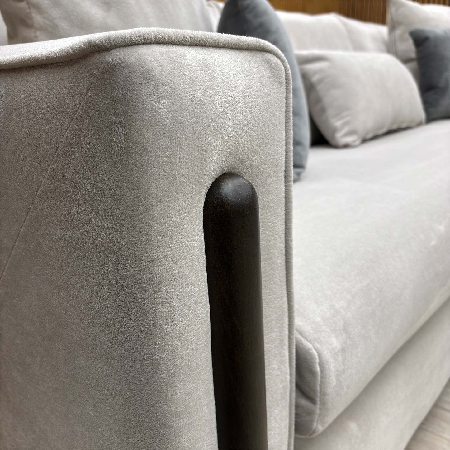 Close-up of the silver towel velvet upholstery, showcasing the fine, textured weave and sophisticated silver-grey tone.