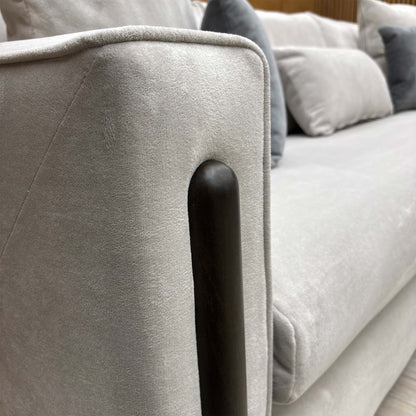 Close-up of the silver towel velvet upholstery, showcasing the fine, textured weave and sophisticated silver-grey tone.