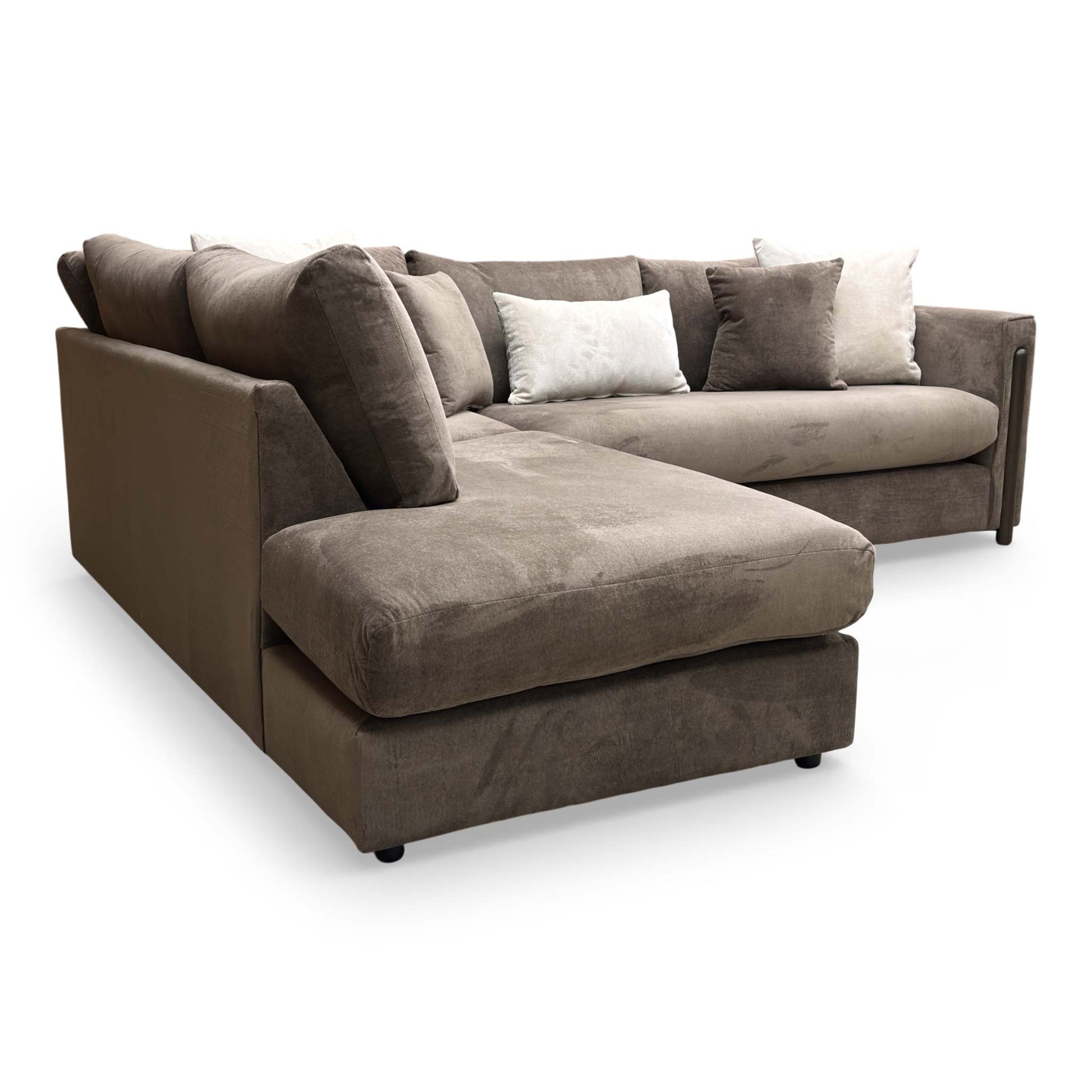 Side profile of the Barney sofa, showcasing the clean lines of the formal back and the height of the cushioned armrests.