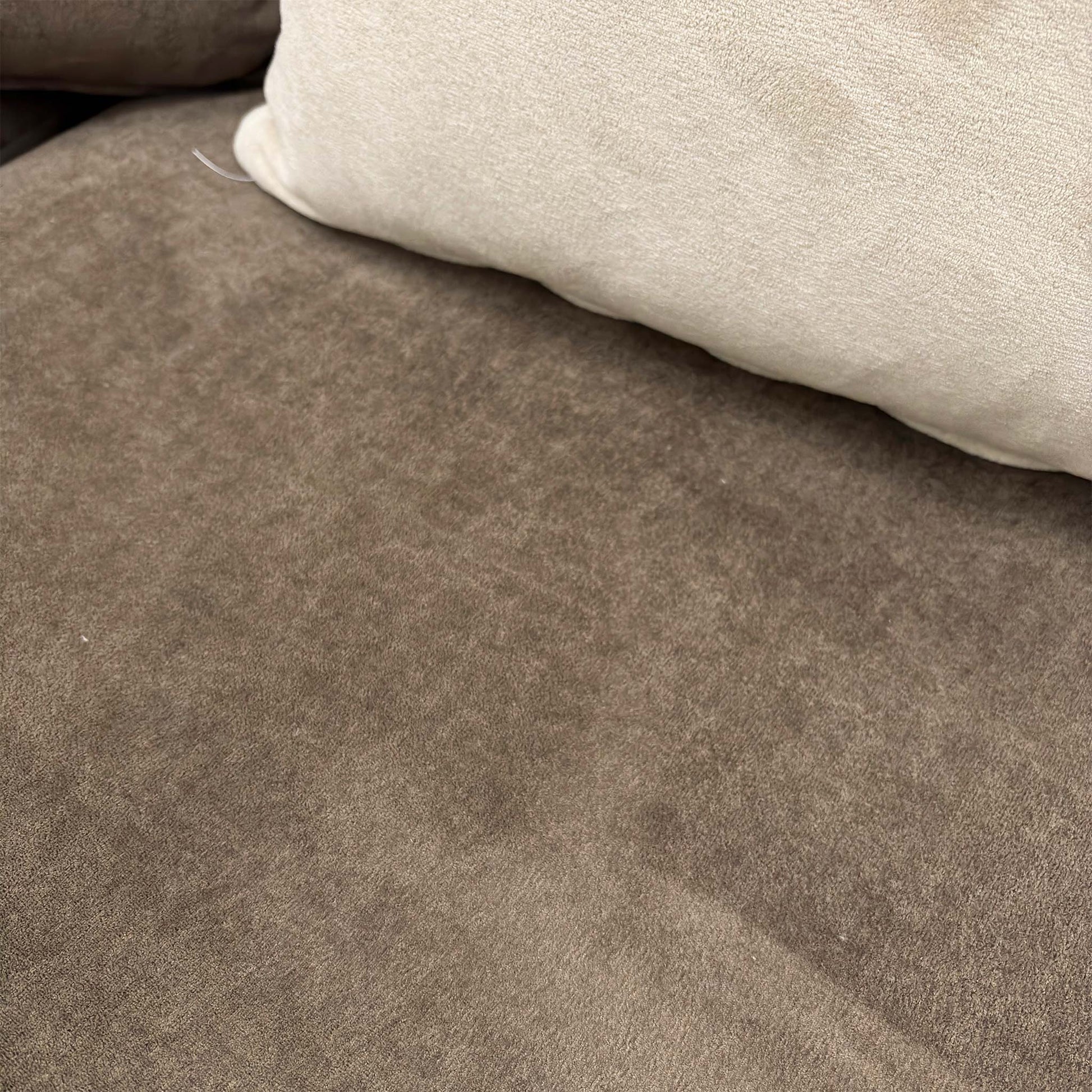 Close-up image of the espresso brown towel velvet upholstery, showing the fabric's soft texture and premium finish.