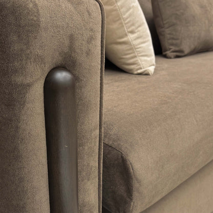Close-up of the luxurious espresso brown towel velvet upholstery, highlighting the fabric's soft texture and rich color.