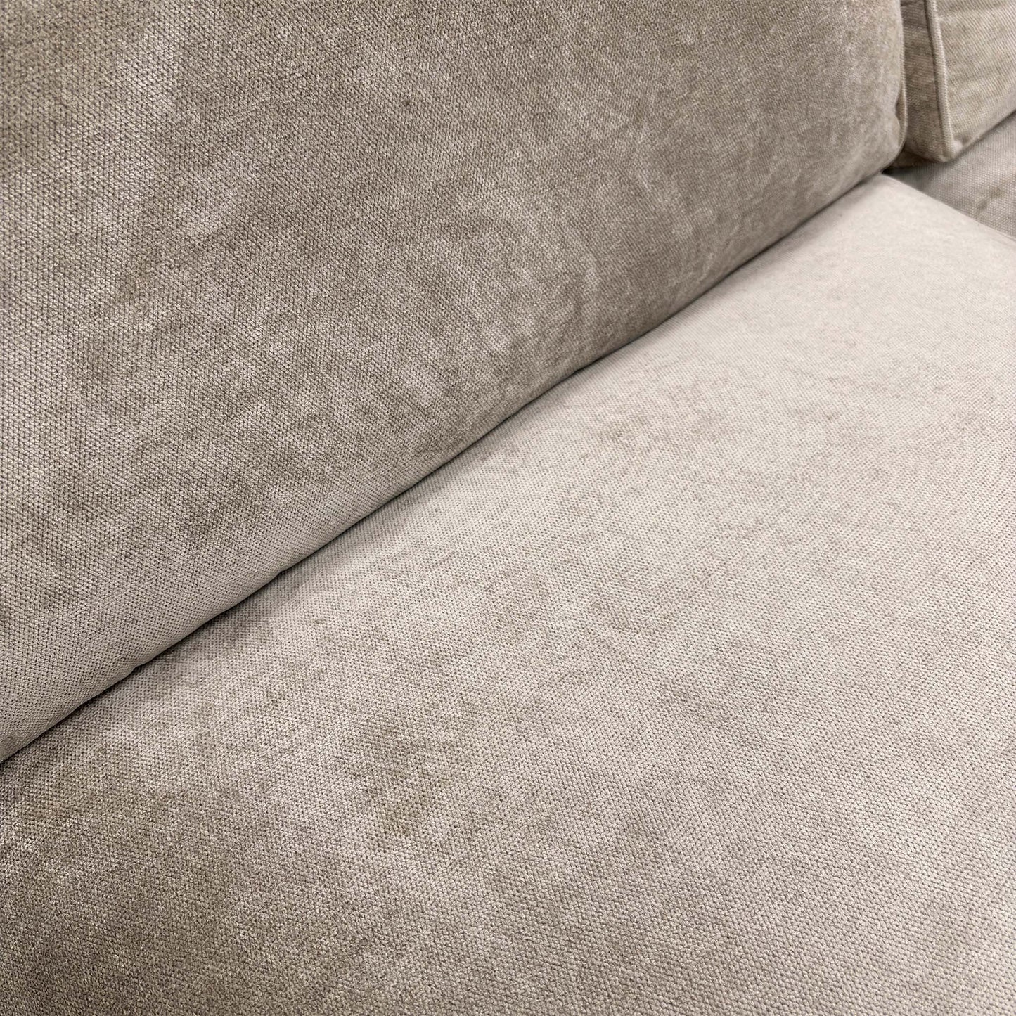 Close-up of the Kingston mink fabric upholstery, showing the soft texture and high-quality weave of the material.