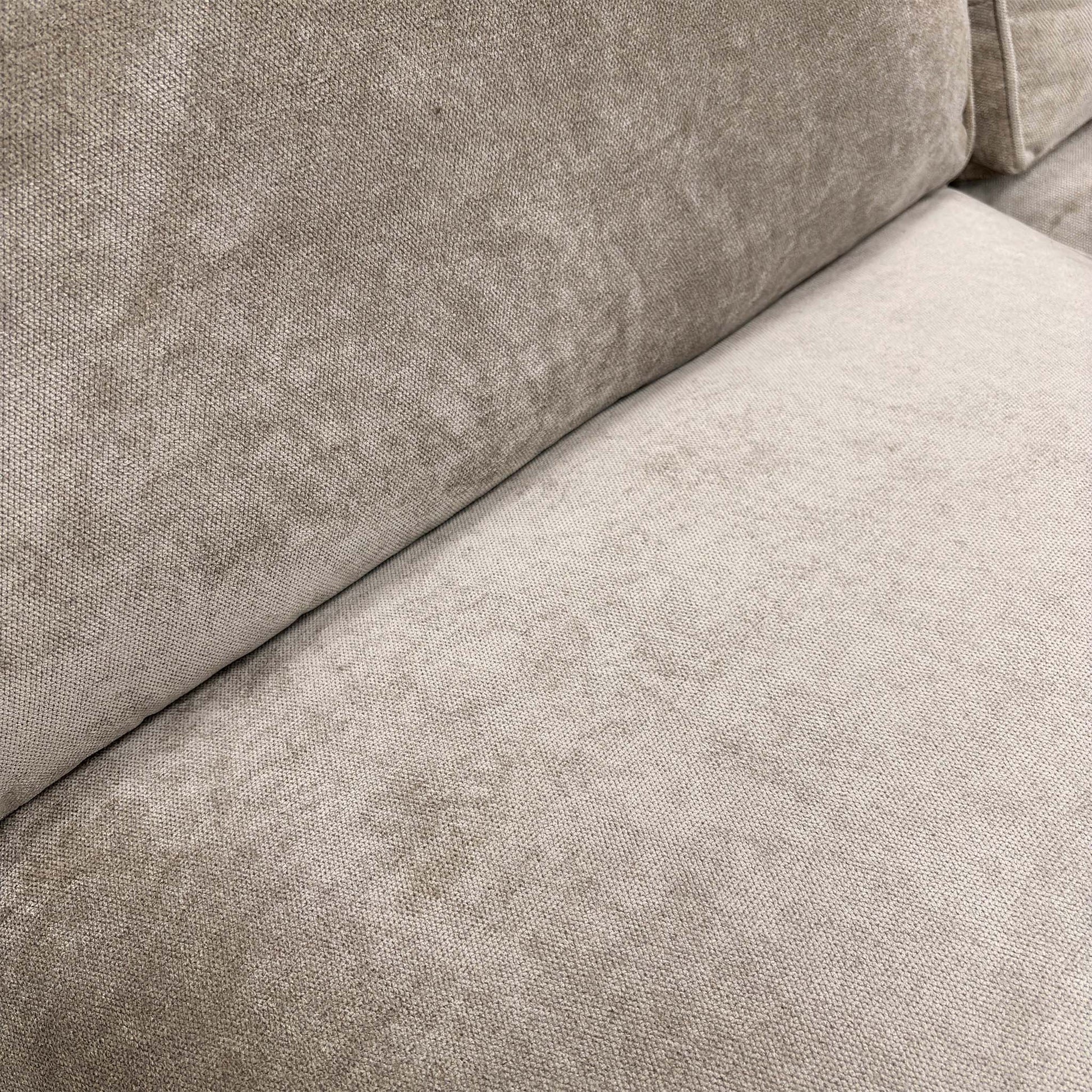 Close-up of the Kingston mink fabric upholstery, showing the soft texture and high-quality weave of the material.