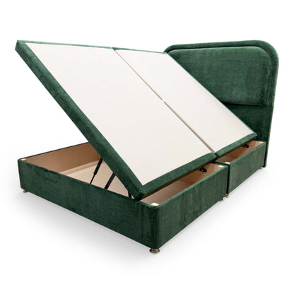View of the complete bed ensemble in a room setting, illustrating how the Aston Moss green fabric complements modern bedroom decor.
