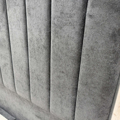 Close-up of the Milan Thunder velvet fabric, showcasing the soft texture and deep charcoal-gray tone used on the ‘Pluto’ bed set.