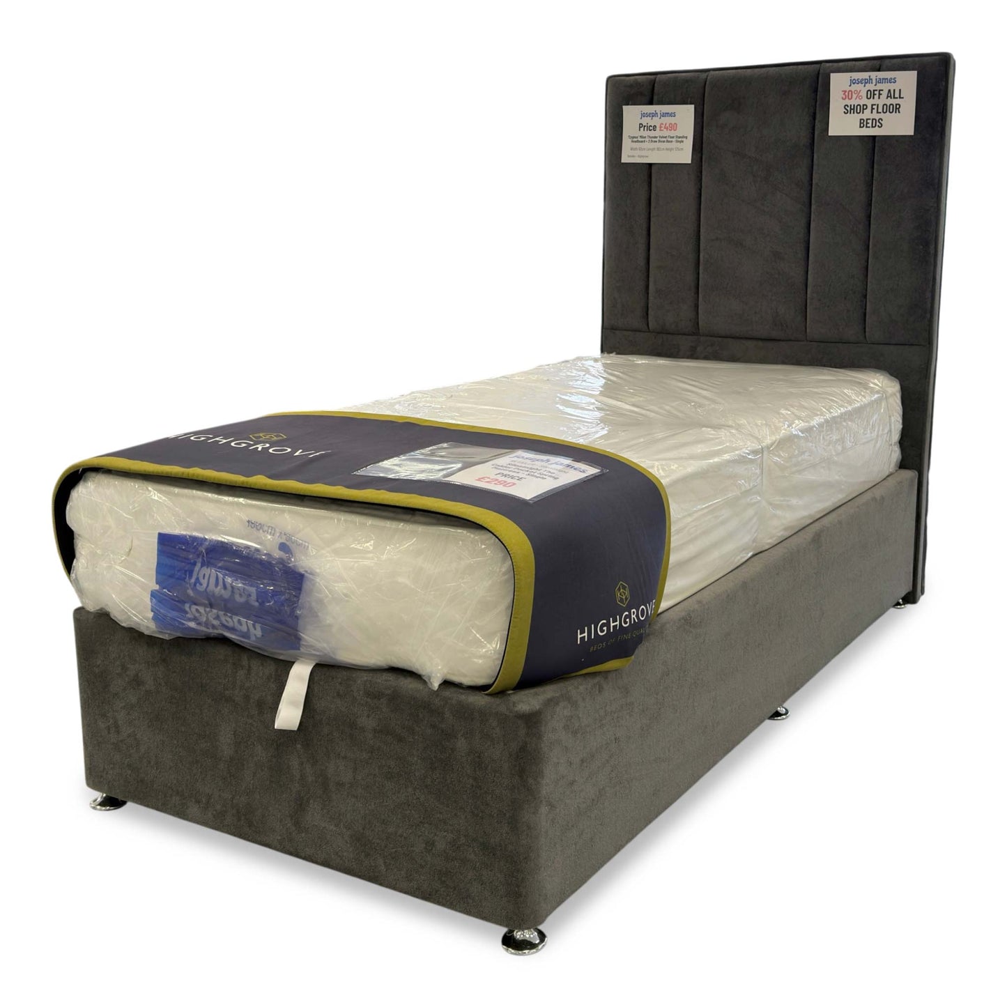 Side view shot of the divan base, showcasing the two integrated storage drawers on the side for convenient bedroom organization.