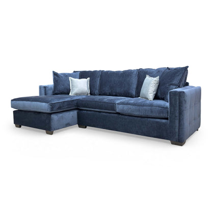 Angled shot from the back of the Chelsea corner sofa, highlighting its sleek wooden frame and formal back design.