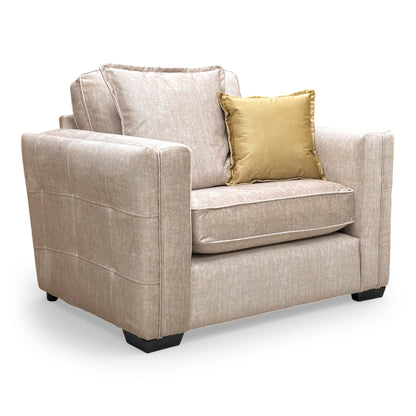 Front view of the Thornbrook 'Chelsea' Snuggler Chair, featuring plush beige Vogue velvet upholstery and a sophisticated formal back design.