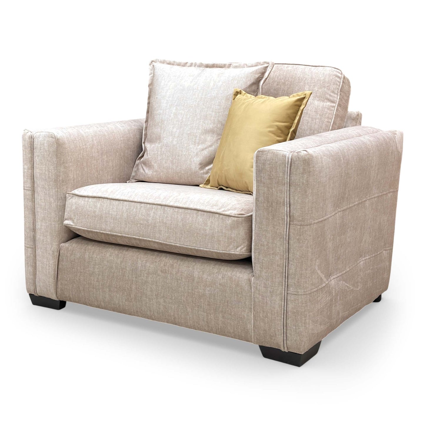 Side profile of the Chelsea snuggler chair, emphasizing the depth of the seat and the clean lines of its contemporary wooden frame.